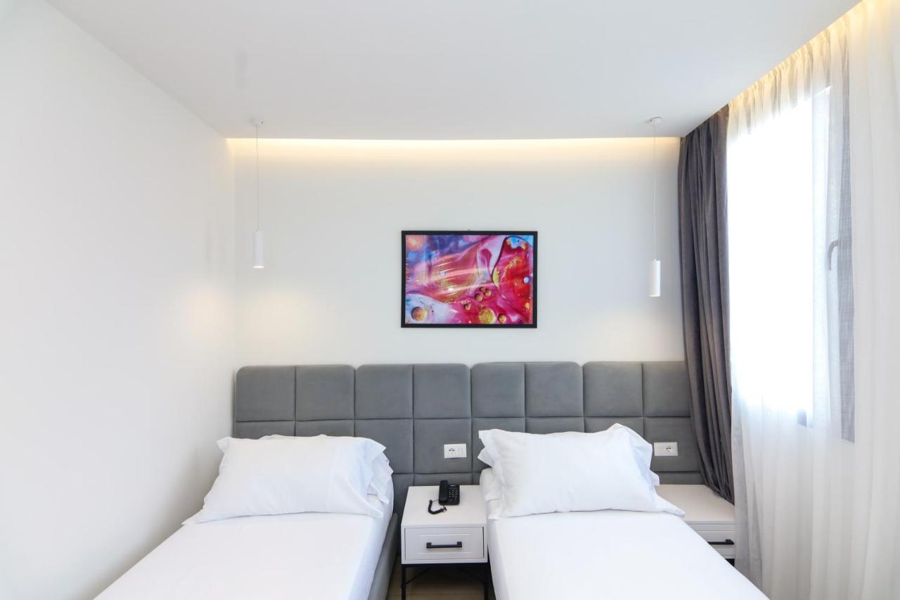N Hotel City Center By Noshi Tirana Bagian luar foto