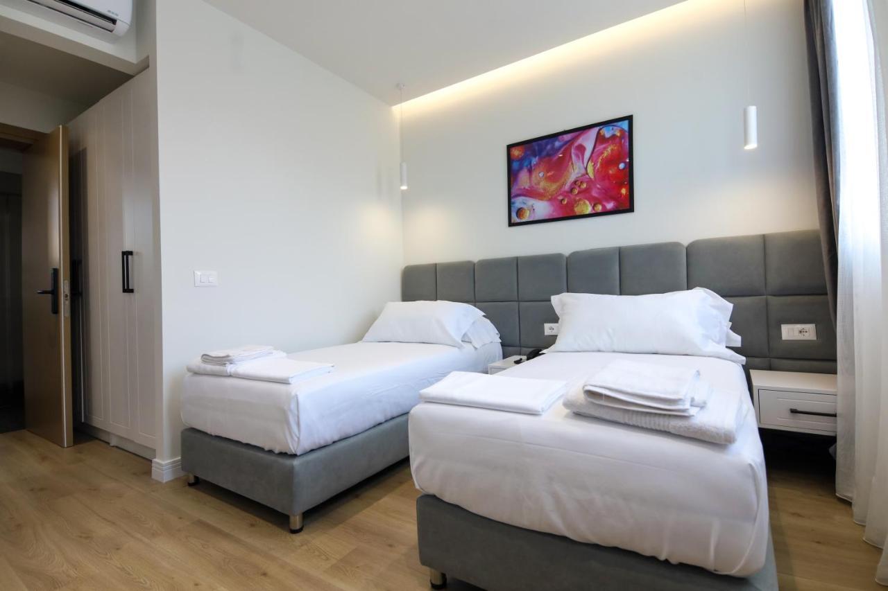 N Hotel City Center By Noshi Tirana Bagian luar foto